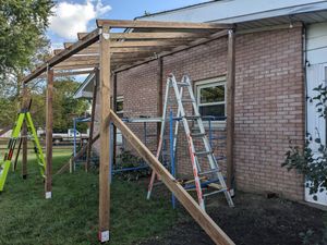 Catio construction with ladders and materials